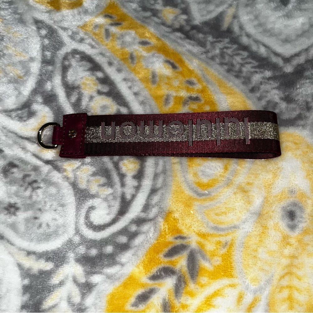 Lululemon garnet and gold mini key chain